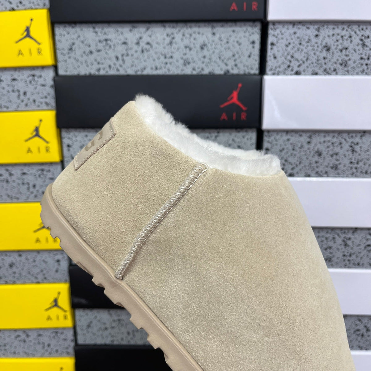 UGG Classic Ultra Mini Boot – Suede Ankle Boot with Shearling Lining, Embossed Logo Patch & Sand Lug Sole in Sand