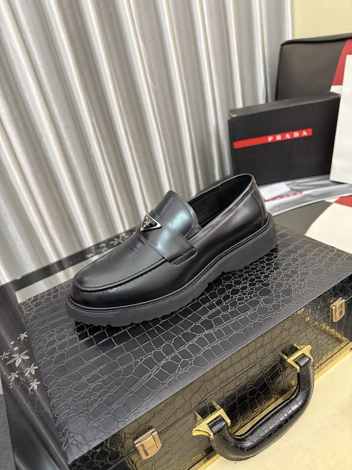 Prada Triangle Plaque Loafers